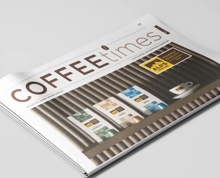 Alps Coffee customer magazine Coffee Times issue 26 autumn-winter 2025/26 opened on table